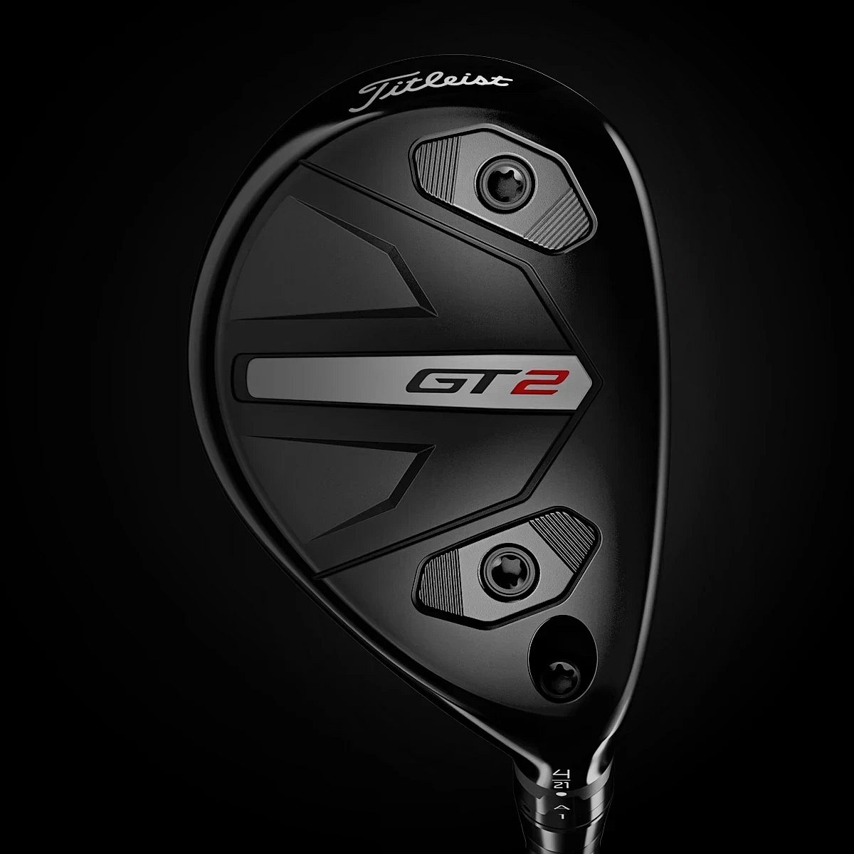 Sóli Titleist GT2 hybrid með lóðunum tveimur, við hæl og tá
