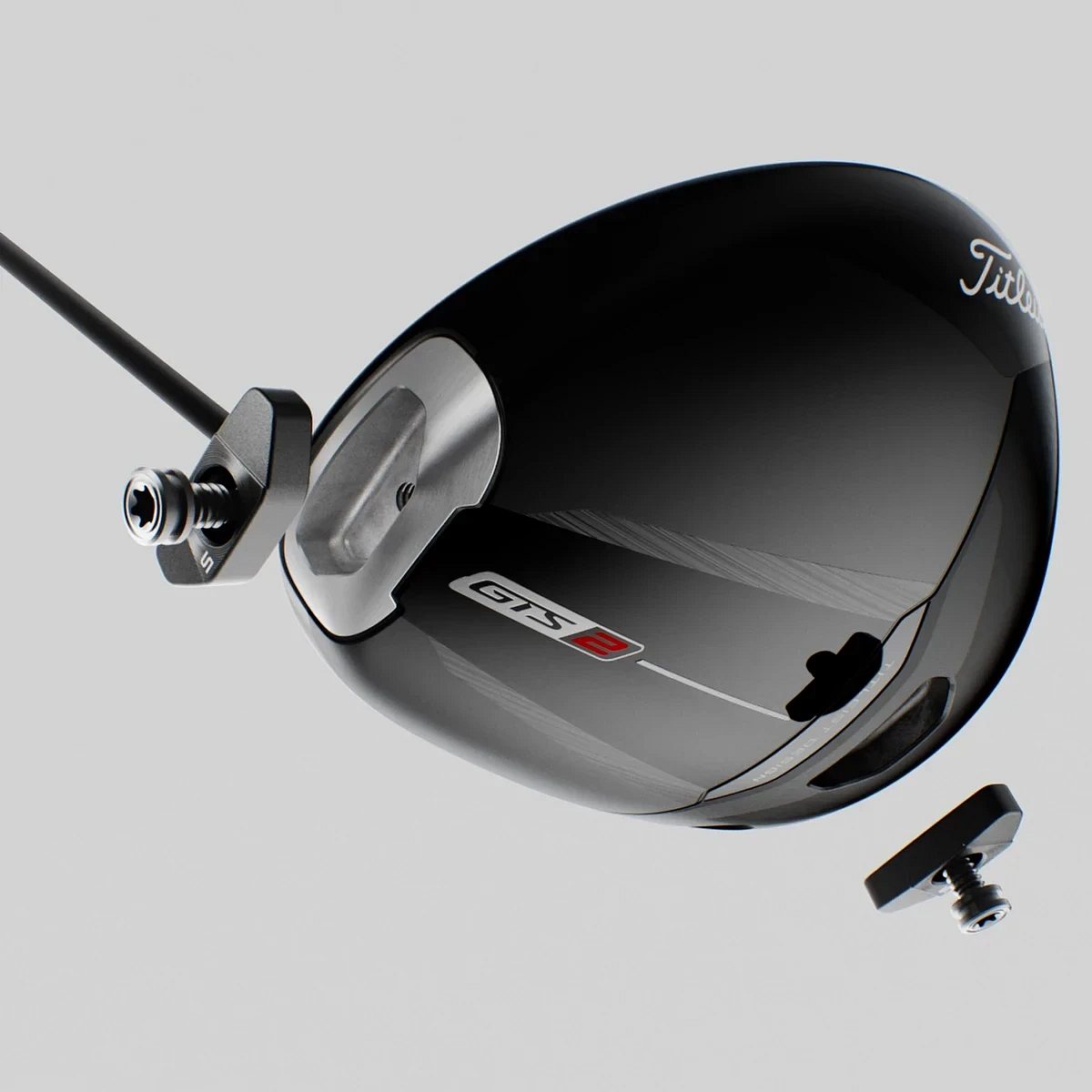 Haus Titleist GTS2 drivers séður að neðan með lóðin tvö skrúfuð úr