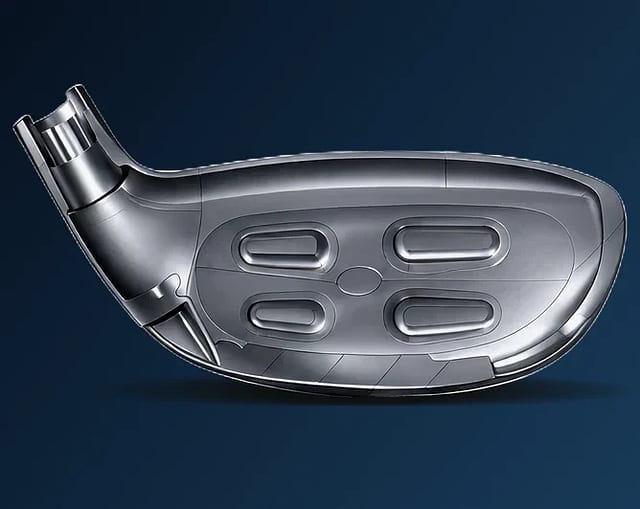 Bakhlið höggflatarins í Mizuno JPX ONE brautartré, með fjórum þykkari svæðum